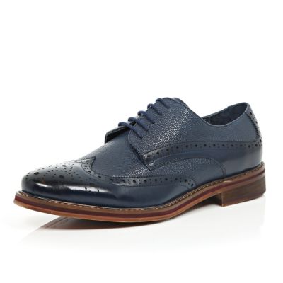 Navy blue pebbled leather brogues